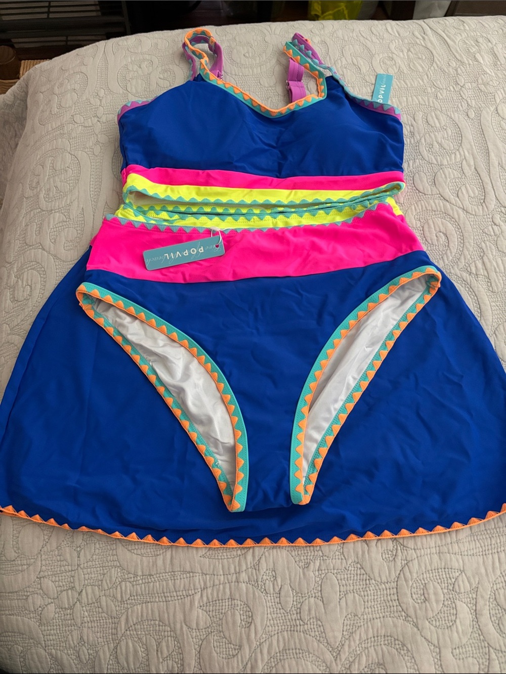 NWT PopVil 3 piece bikini in blue, pink and neon yellow in size medium.